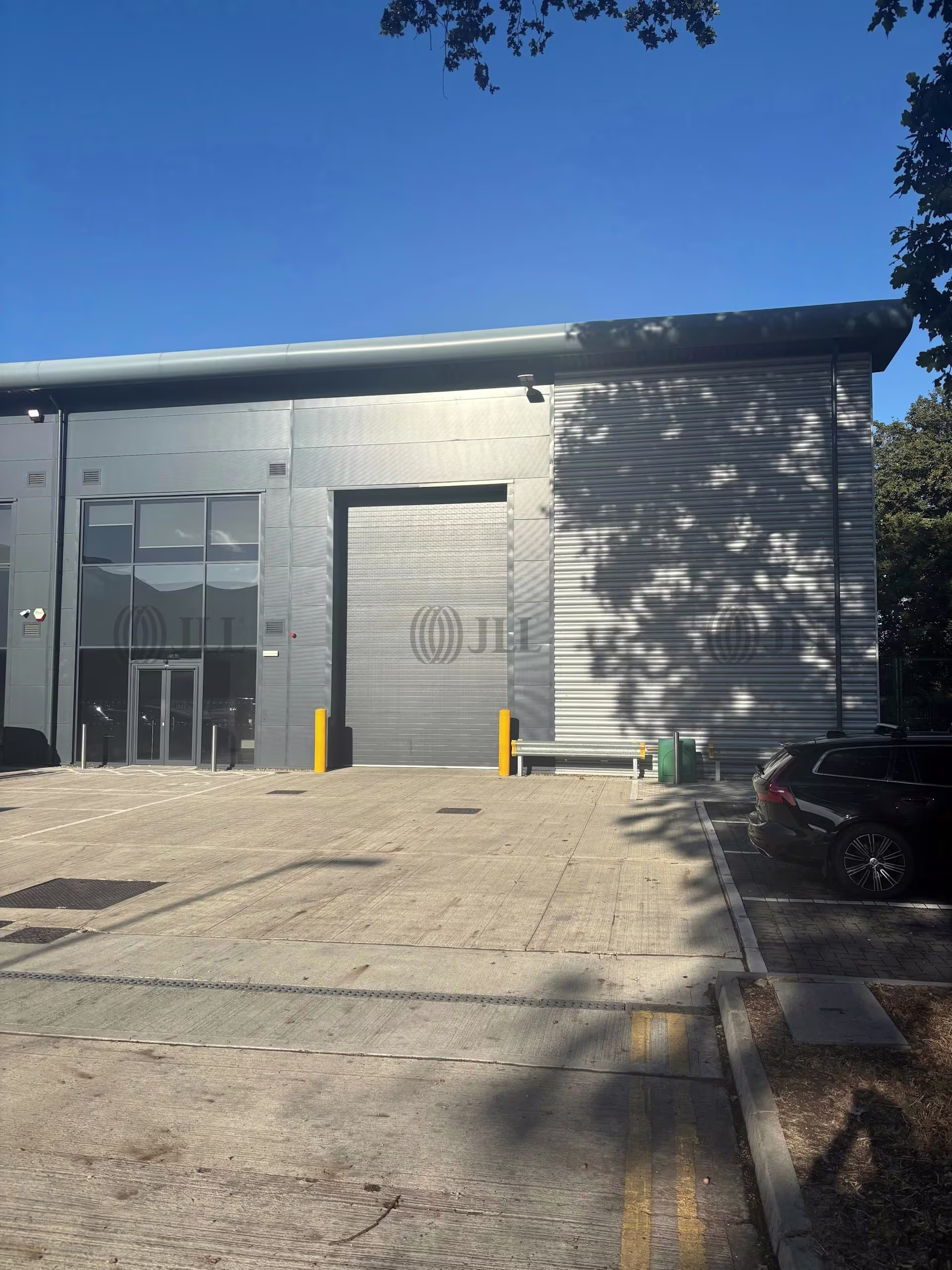 Unit D1 exterior with glazed entrance and loading door
